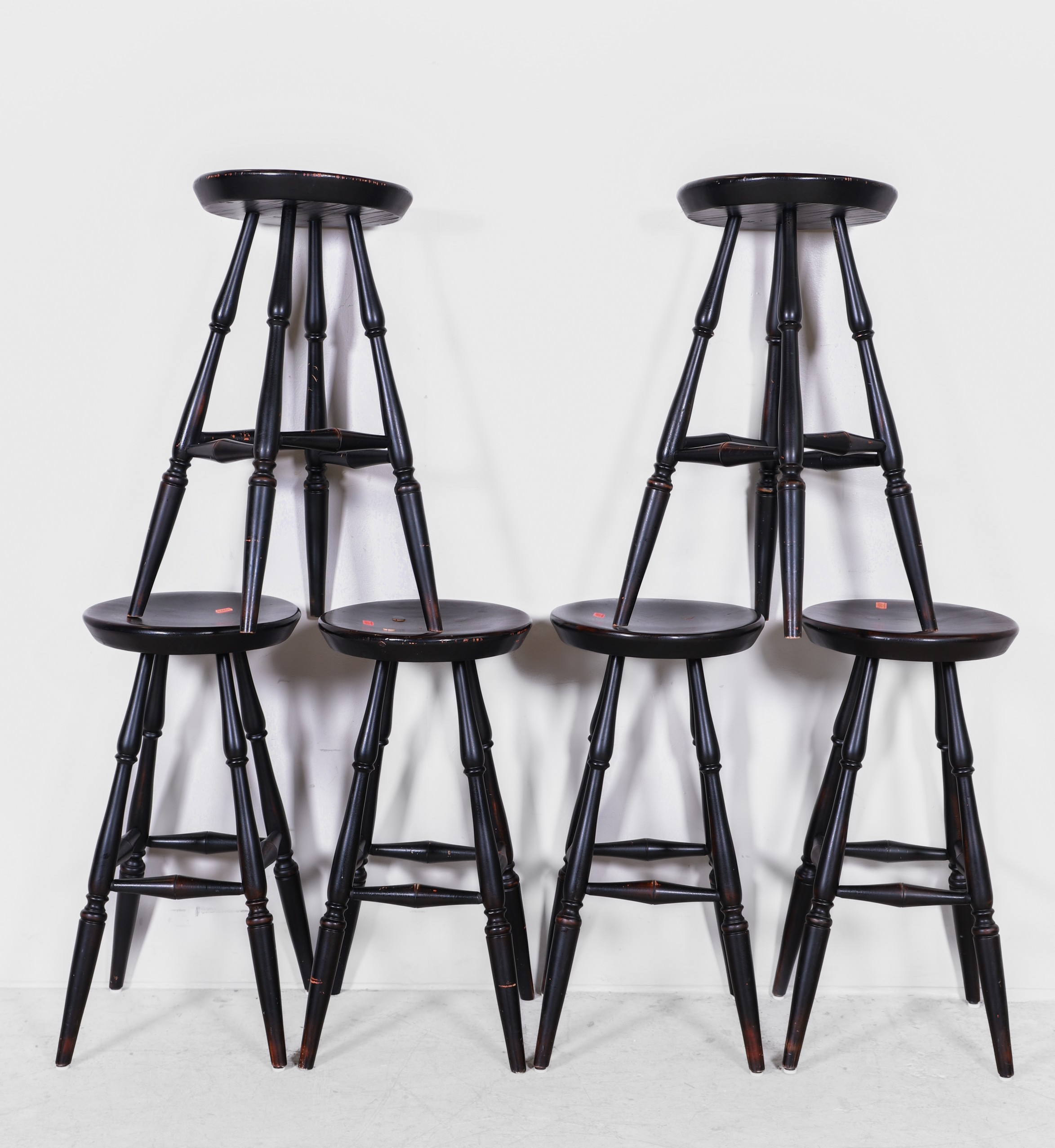 A set of six black painted