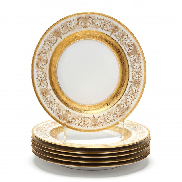 A SET OF SIX GILT ENCRUSTED