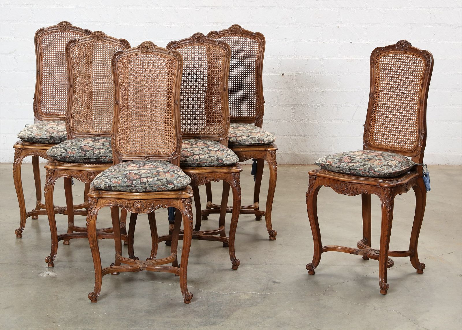 A SET OF SIX LOUIS XV STYLE CANED