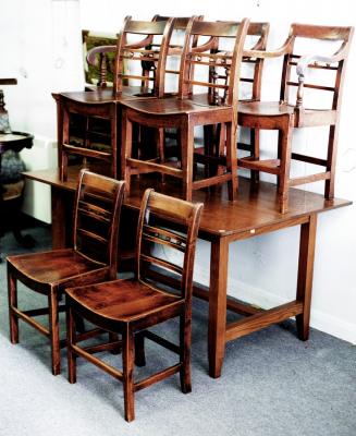 A set of six oak and elm dining