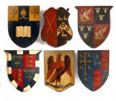 A set of six painted armorial