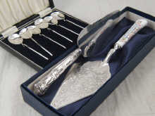 A set of six silver tea spoons in