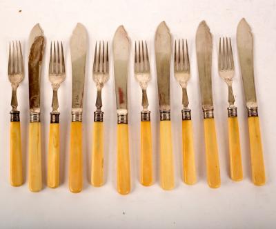 A set of six silver fish knives and