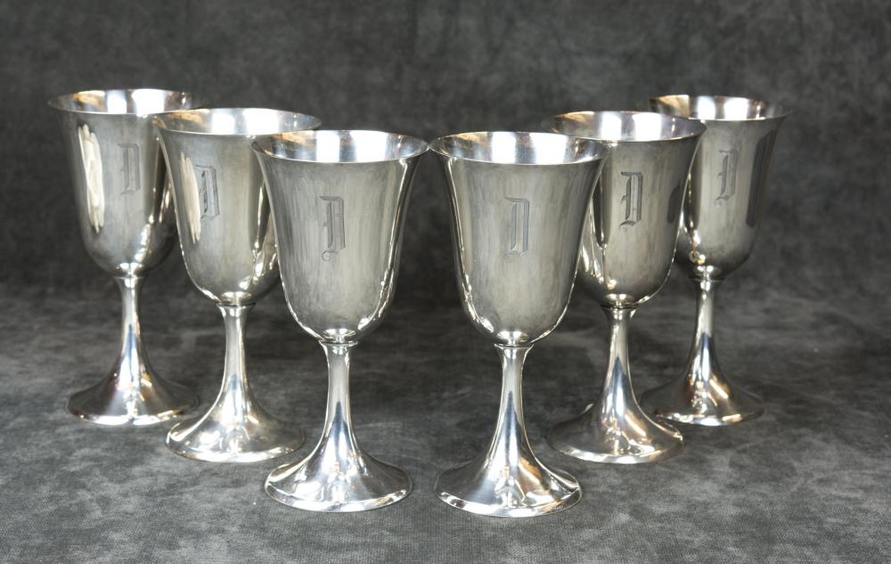 A SET OF SIX STERLING SILVER WINE