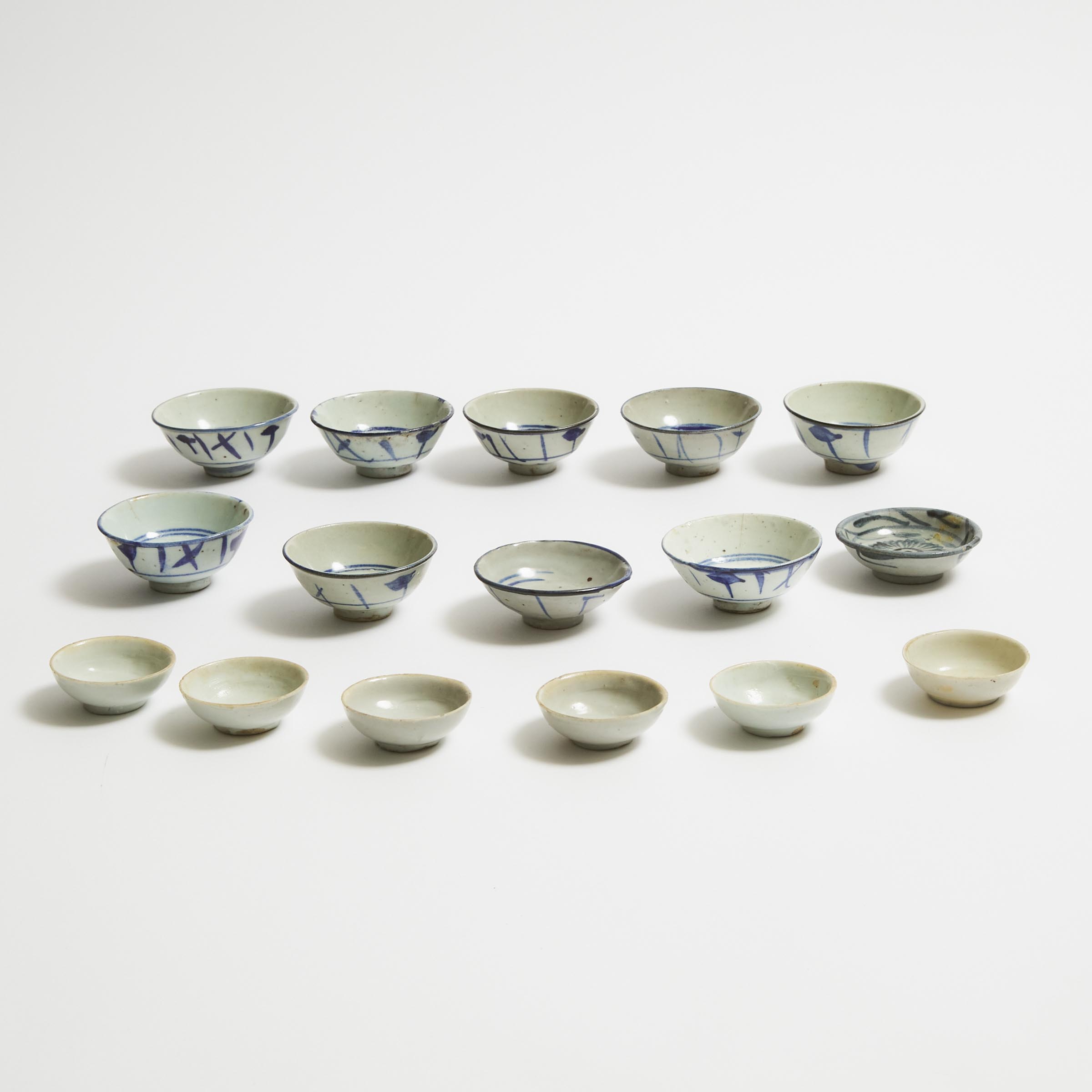 A Set of Six White-Glazed Wine