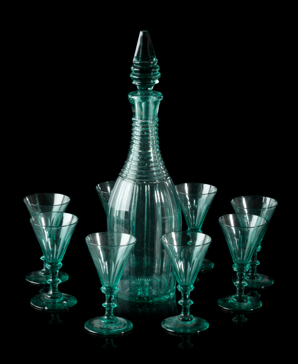 A SET OF SIX WINE GLASSES AND
