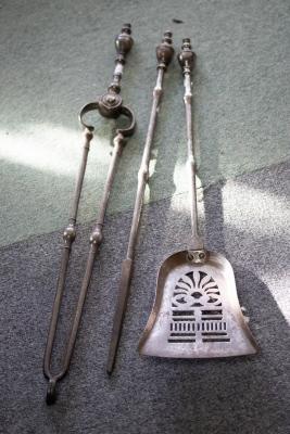A set of three brass fire