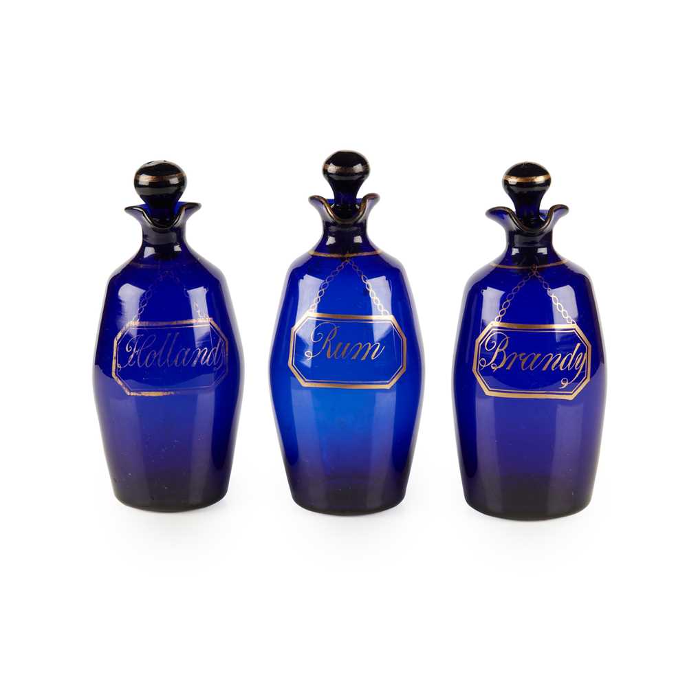 A SET OF THREE BRISTOL BLUE GLASS