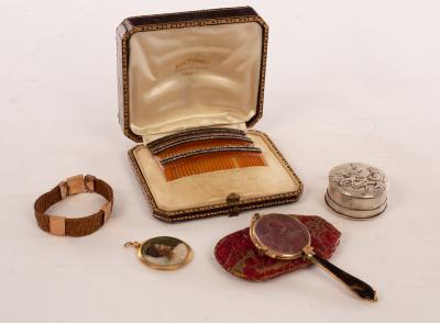 A set of three hair combs each