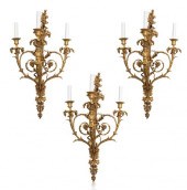 A SET OF THREE ORMOLU CANDELAB