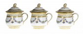 A SET OF THREE PARIS POT À JUS
