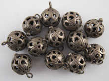 A set of twelve antique pierced