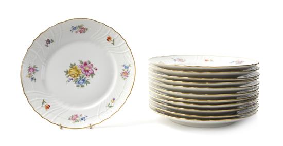 *A Set of Twelve Dinner Plates