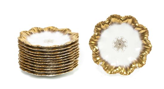 A Set of Twelve French Limoges