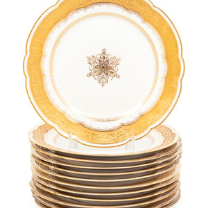 A Set of Twelve Limoges Gilt