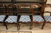 A SET OF TWELVE MAHOGANY LATE