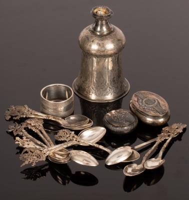 A set of twelve Malay white metal