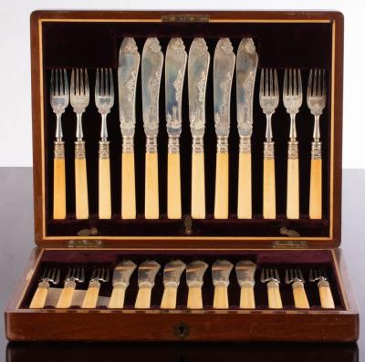 A set of twelve silver fish