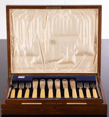 A set of twelve silver fish