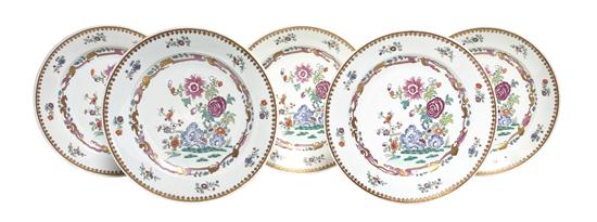 A Set of Twenty Porcelain Dinner