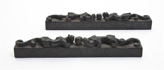 A Set of Two Stone Scroll Weights