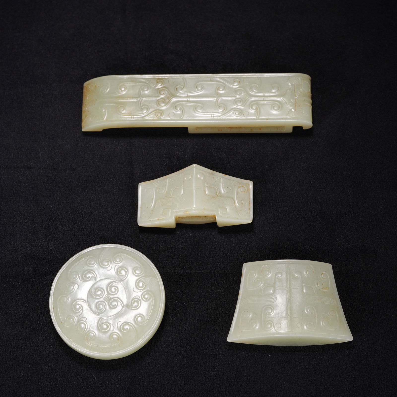 A SET OF WHITE JADE ORNAMENTS,QINGA