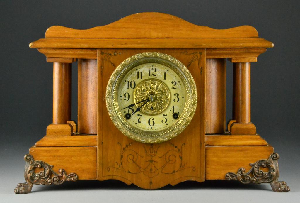 A Seth Thomas Wood And Metal Mantle