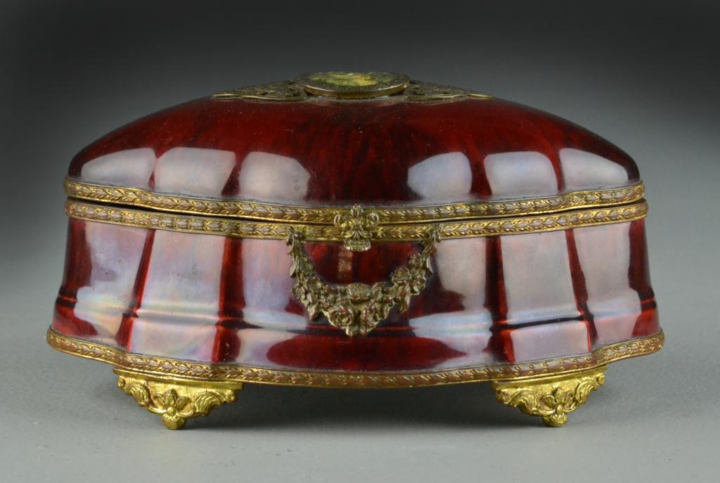 A Sevres Porcelain And Gilt Metal