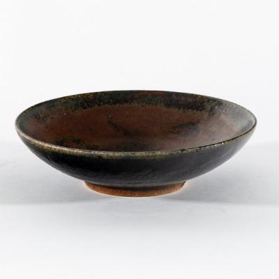 A shallow stoneware bowl, by