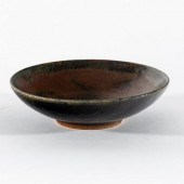 A shallow stoneware bowl, by H