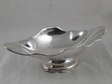 A shaped silver fruit dish marked