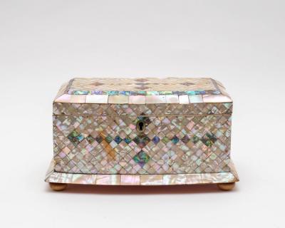 A shell covered tea caddy, with