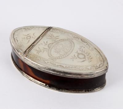 A shell lidded silver oval box,