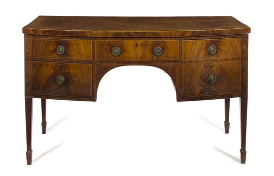 A Sheraton Mahogany Sideboard