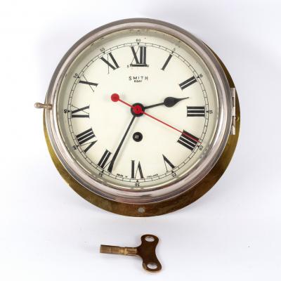 A ships brass cased eight-day clock