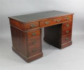 A Shoolbred & Co mahogany pede