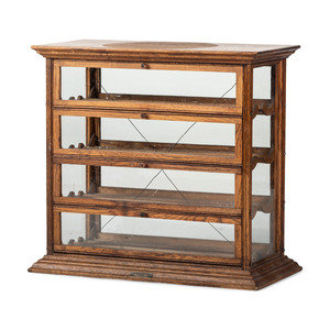 A Showcase Spool Cabinet A.N.