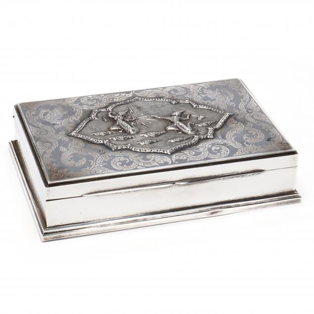 A SIAMESE STERLING SILVER BOX