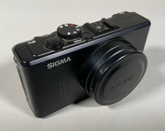 A Sigma DP1s compact digital camera