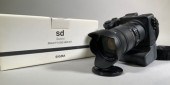A Sigma SD Quattro with two ba