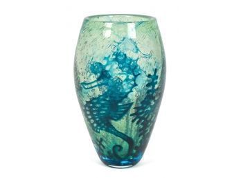 A signed art glass vase with