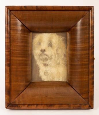 A silkwork picture of a terrier,