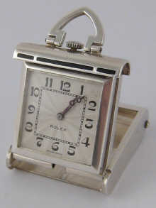A silver and black enamel sports or