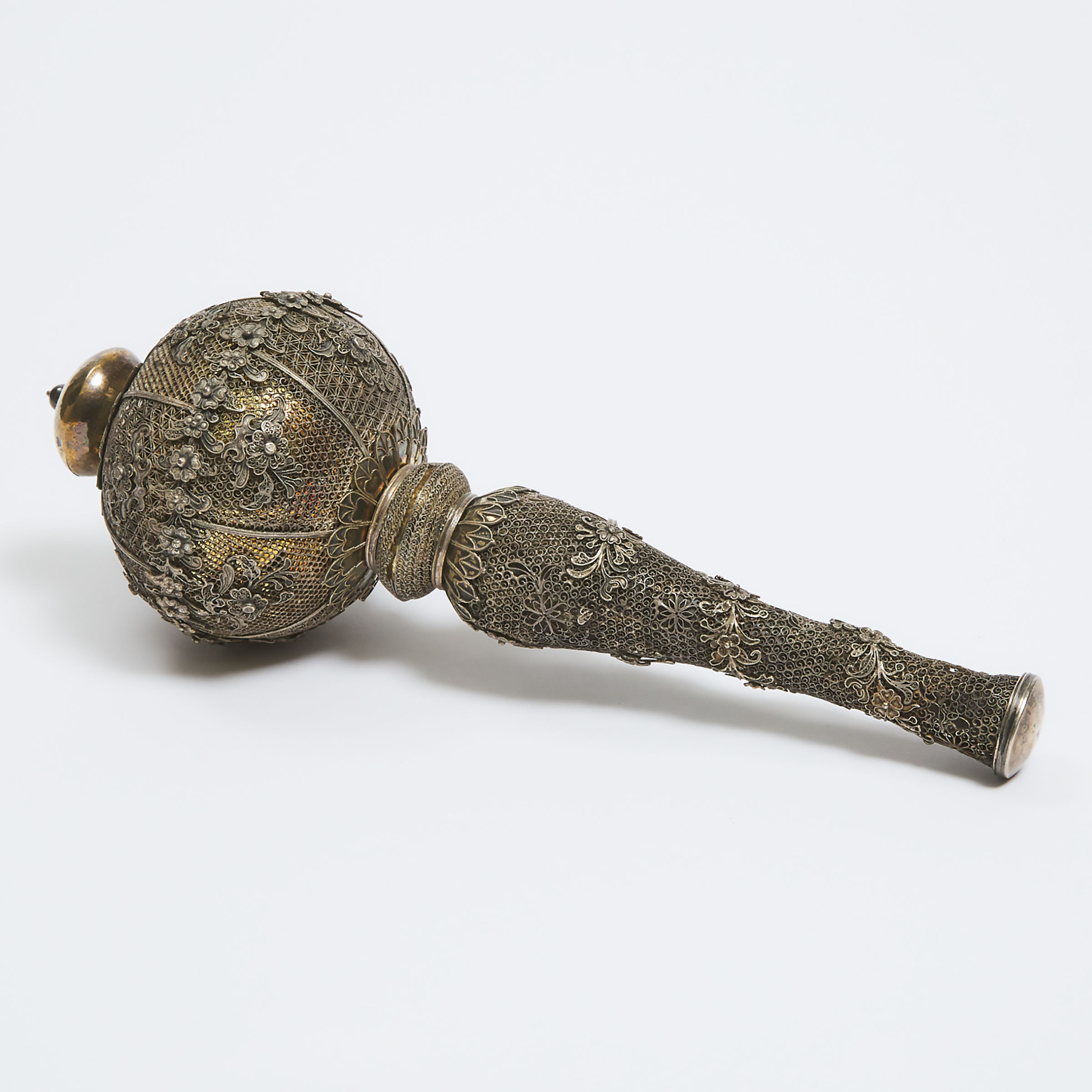A Silver and Brass Filigree