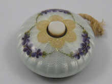 A silver and enamel bell push