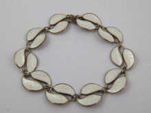 A silver and enamel bracelet