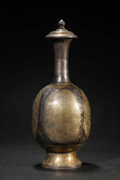 A SILVER AND GILT 'MYTHICAL BE