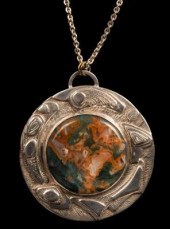 A silver and moss agate pendan