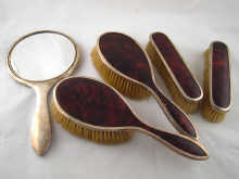 A silver and tortoiseshell dressing
