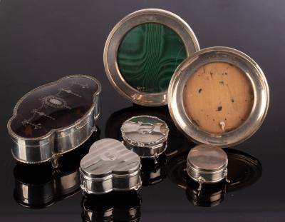 A silver and tortoiseshell